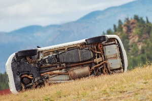 vehicle on side after being involved in rollover crash in Sacramento