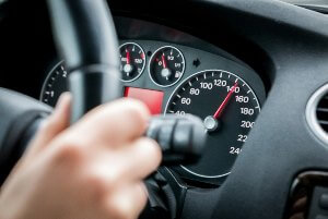 dashboard showing car speeding at 140 mph